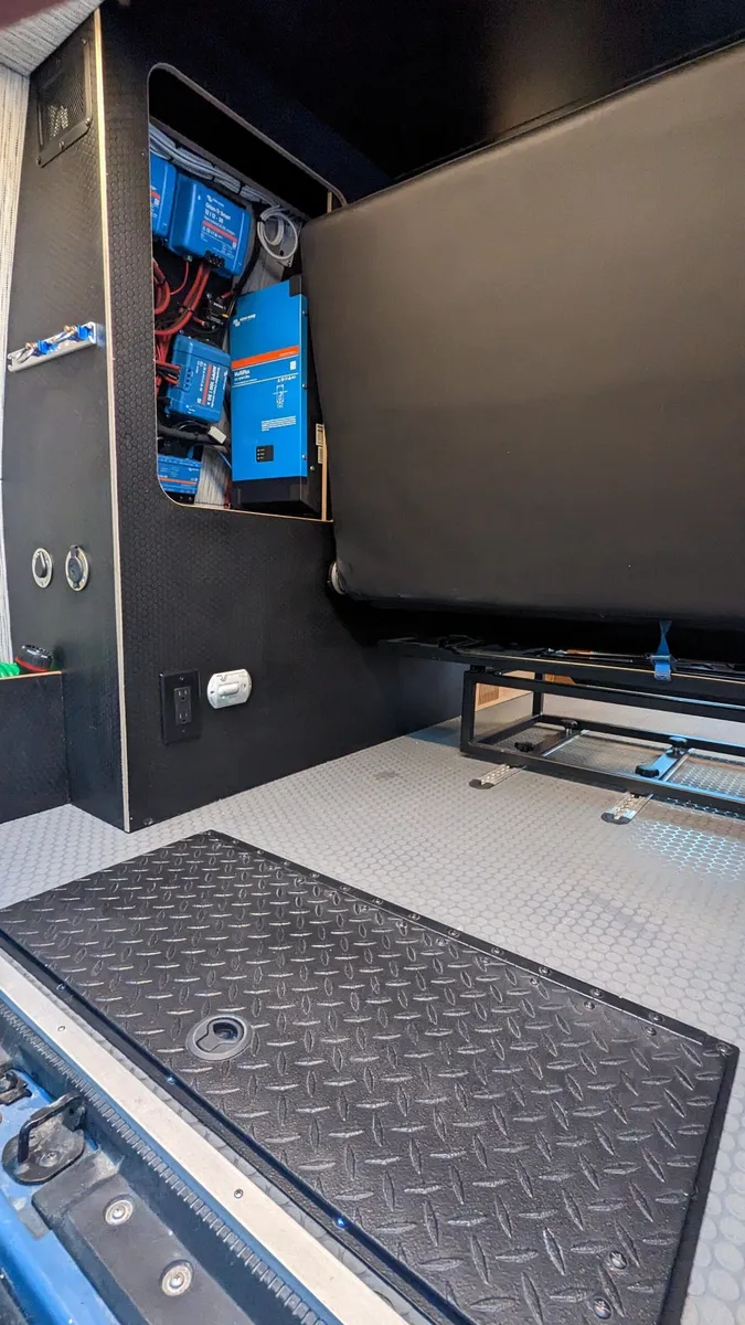 Iconic Ford E-350 Quigley 4x4 Camper Van Blends Utility and Adventure
