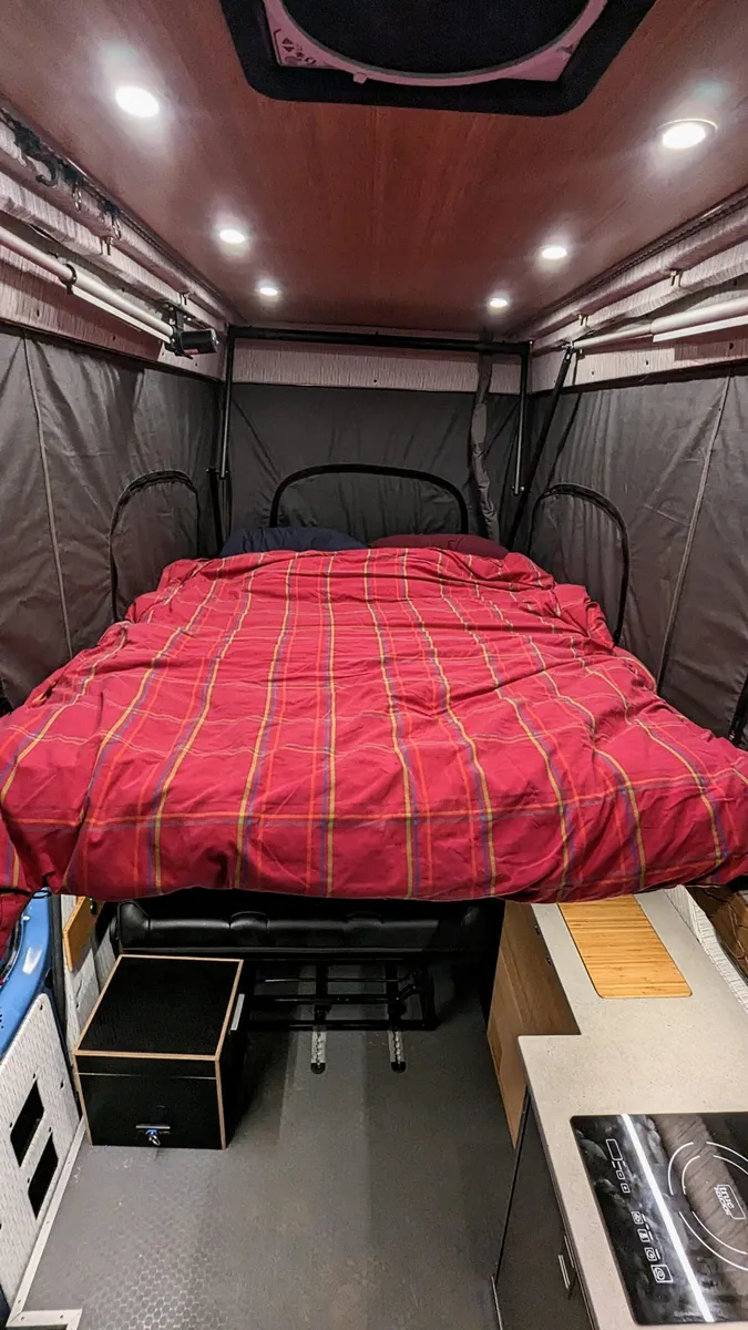 Iconic Ford E-350 Quigley 4x4 Camper Van Blends Utility and Adventure